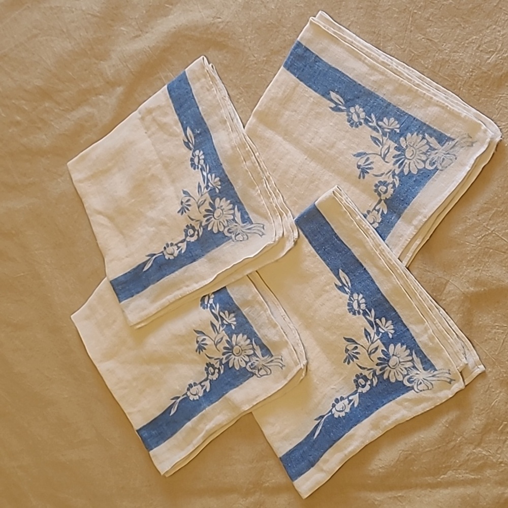 Four blue and white vintage napkins